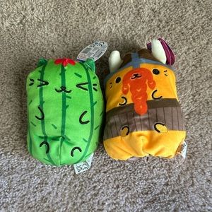 Cats vs pickles mini plushies, one reversible